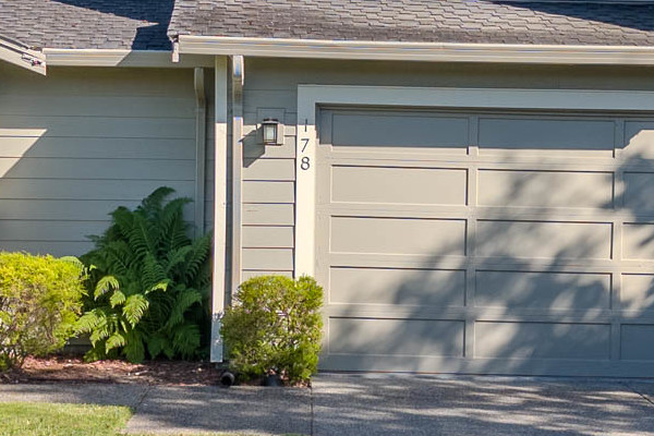 Home exterior in Alameda, CA featuring James Hardie Lap Siding in Monterey Taupe and Andersen A100 Windows