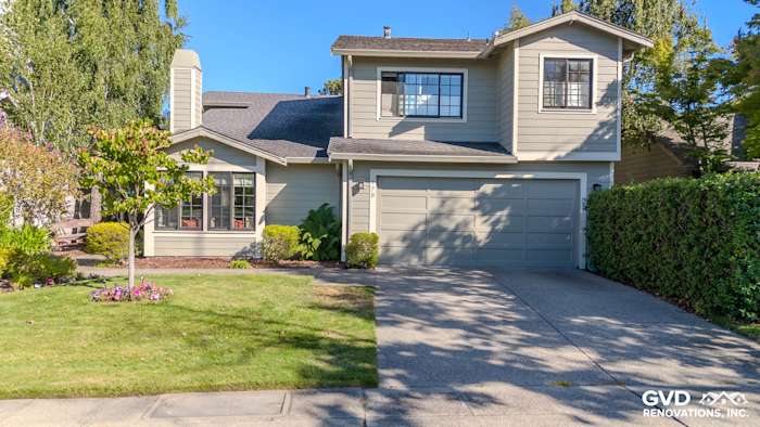 Home exterior in Alameda, CA featuring James Hardie Lap Siding in Monterey Taupe and Andersen A100 Windows