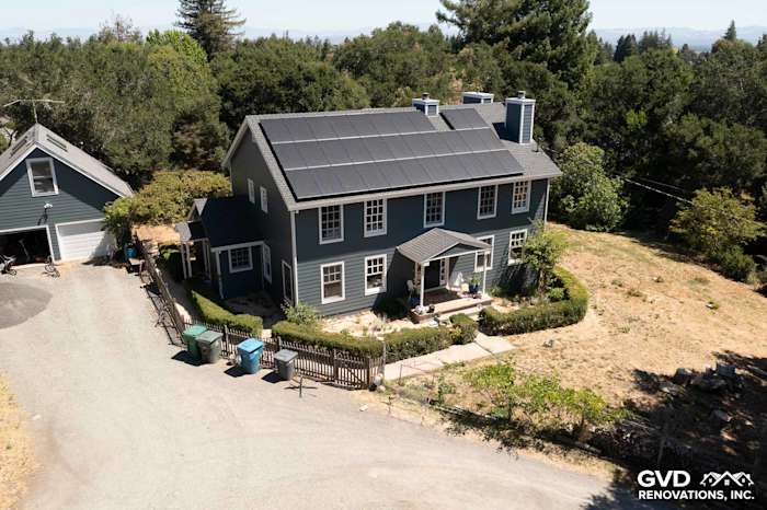 Evening Blue James Hardie lap siding with Arctic White trim on a two-story home in Sebastopol, CA