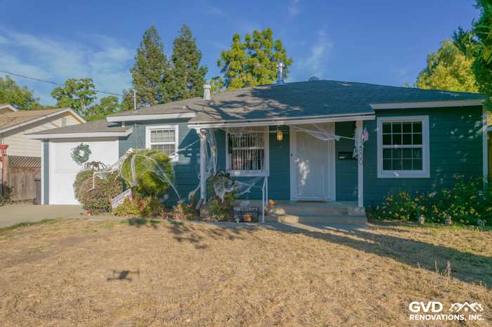 Exterior of a home featuring Evening Blue James Hardie siding and Arctic White trim in Concord, CA
