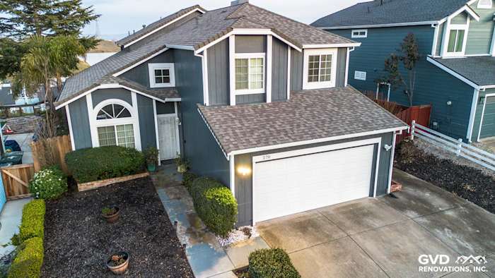 Two-story home exterior featuring James Hardie Evening Blue siding and Arctic White trim in Vallejo, CA
