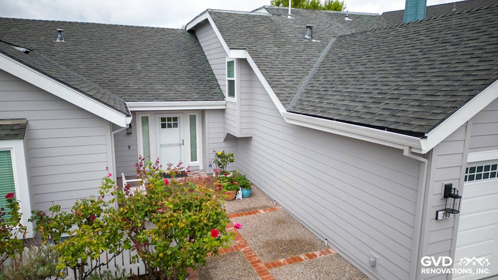 Newly installed Pearl Gray James Hardie siding and Milgard windows on a home in Foster City, CA