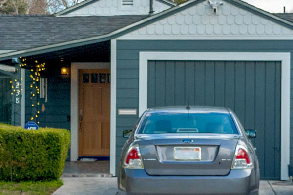 Modern home exterior in Redwood City, featuring James Hardie siding in Evening Blue with Arctic White trim