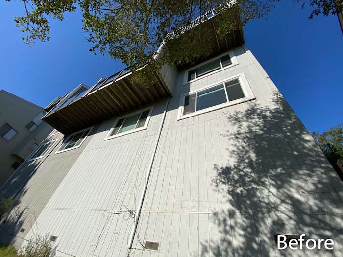 Before installation of pre-finished James Hardie lap siding on home exterior in Mill Valley, showcasing existing condition