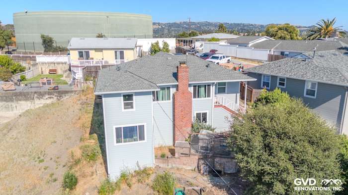 Updated home exterior with Light Mist James Hardie Lap Siding and Arctic White trim in Castro Valley, CA