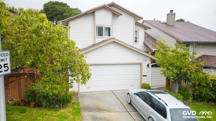 Home exterior featuring new Khaki Brown James Hardie Fiber Cement Siding and Rustic Grain trim in San Mateo, CA