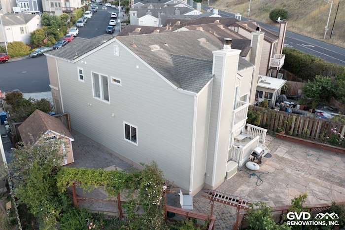 Daly City home featuring James Hardie Lap Siding in Monterey Taupe and Cobble Stone trim, highlighting exterior upgrades
