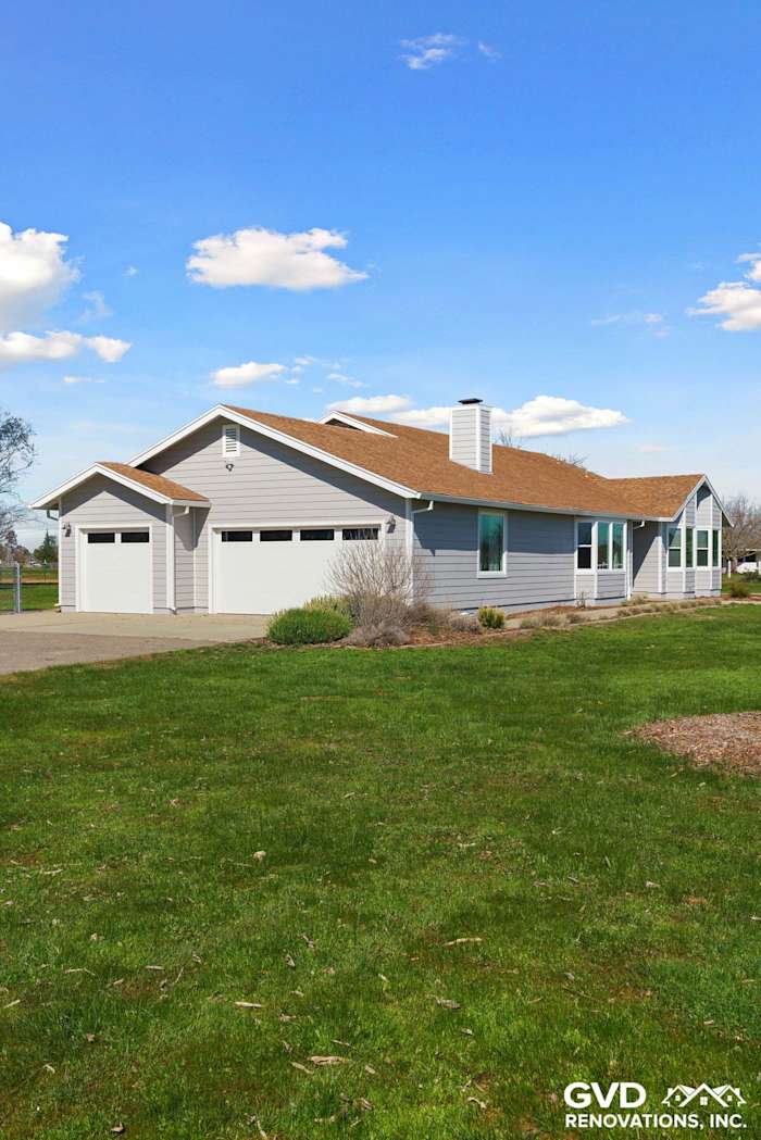Home exterior featuring Pearl Gray James Hardie Siding and Arctic White trim in Galt, CA