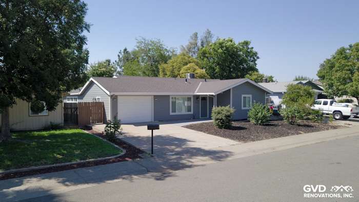Home exterior in Rocklin featuring Seal Gray HardiePlank Lap Siding and Arctic White HardieTrim Boards