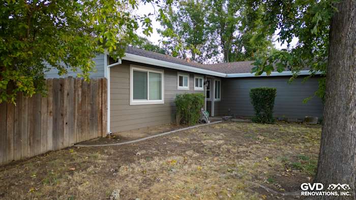 New Cobble Stone James Hardie siding on home exterior with landscaped yard in Orangevale, CA