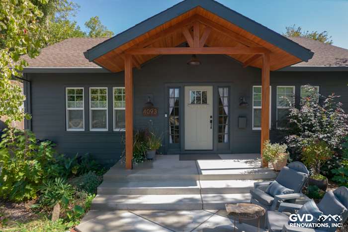 Home exterior featuring James Hardie Iron Gray siding, modern porch, and contrasting trim in Sacramento