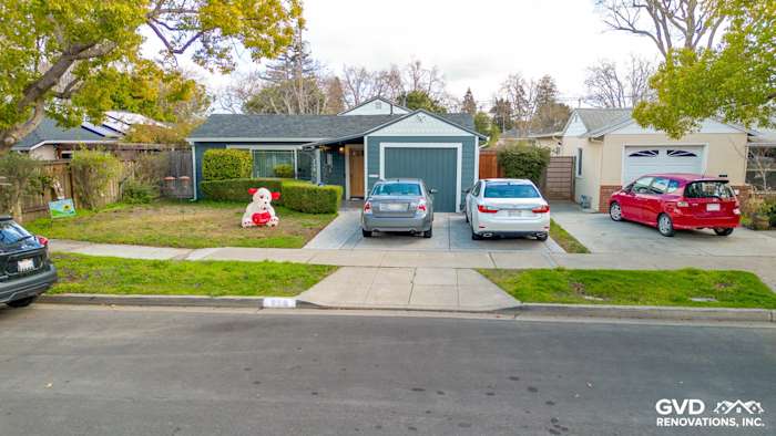 Home exterior remodel featuring James Hardie siding in Evening Blue with Arctic White trim in Redwood City