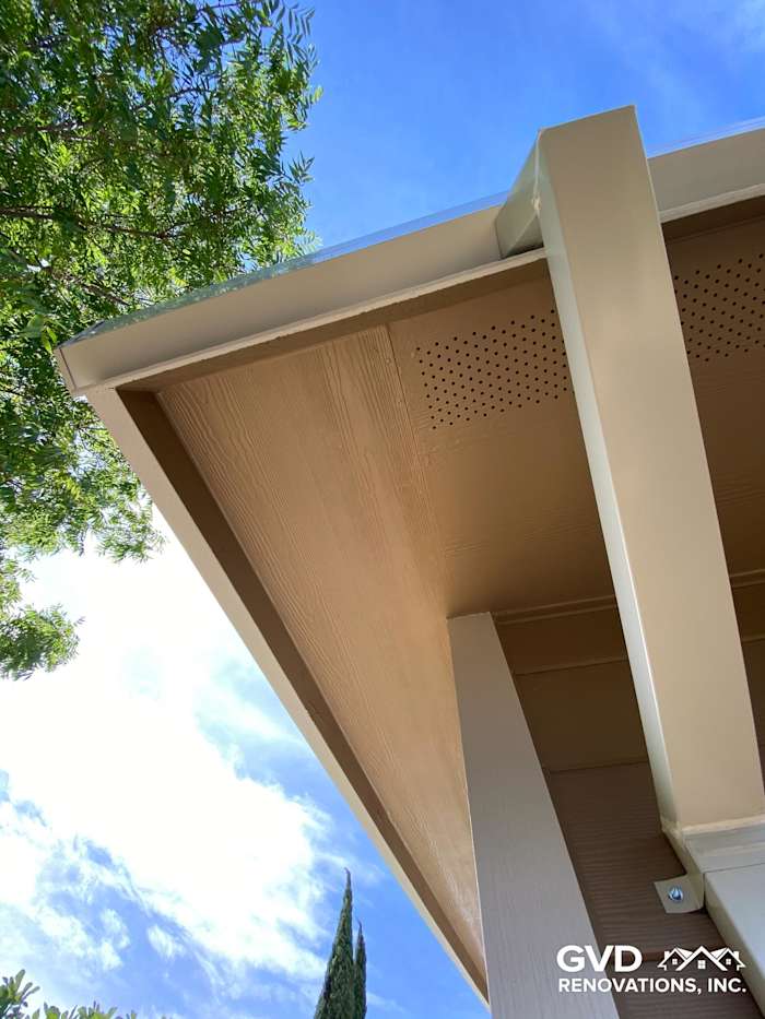 Khaki brown James Hardie lap siding with Arctic white trim and overhang details in Fairfield, CA
