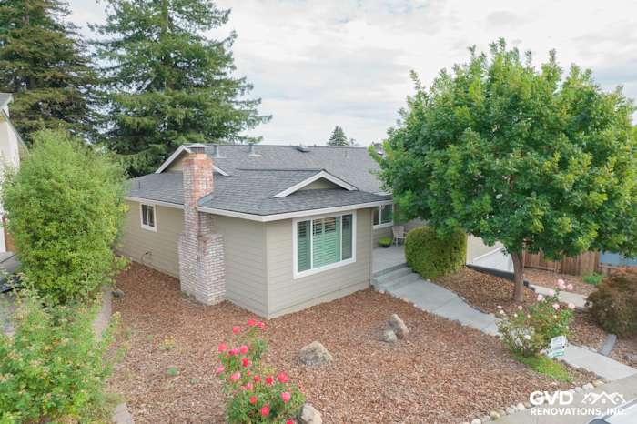 Home exterior featuring Monterey Taupe James Hardie siding, Arctic White trim, and Anlin Catalina Windows in Petaluma
