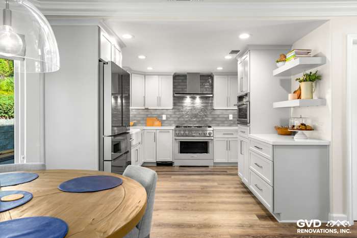 Modern Rocklin kitchen remodel featuring gray cabinets, quartz countertops, and stainless steel appliances