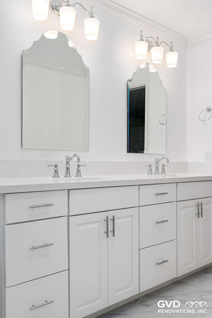 Bright bathroom with double vanity, quartz countertop, and modern fixtures in Fair Oaks, CA