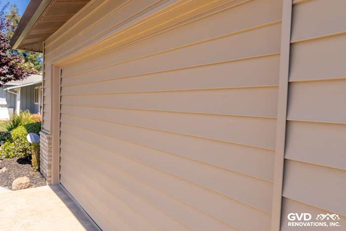 New Alside Prodigy vinyl siding in a soft beige covering a home exterior in Rio Linda, CA