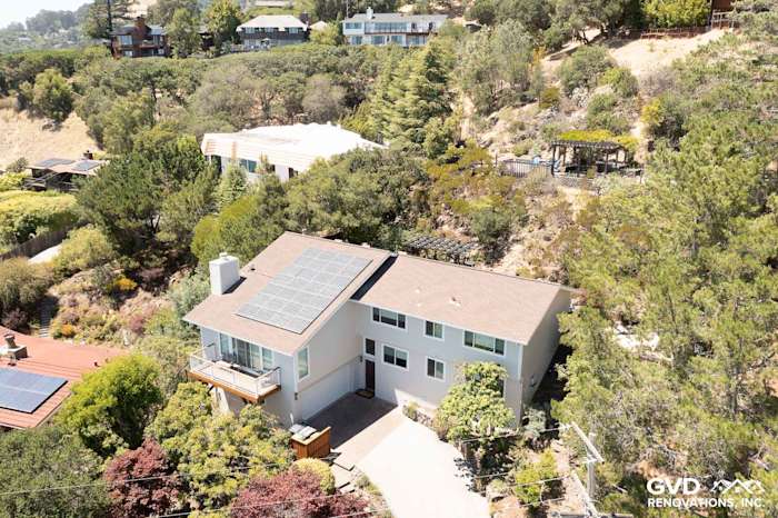 Home exterior in San Rafael featuring James Hardie siding in Cobble Stone with Arctic White trim and solar panels
