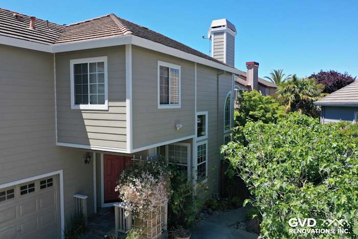 New Monterey Taupe James Hardie siding and Arctic White trim on Petaluma home exterior, showcasing a modern, fresh look
