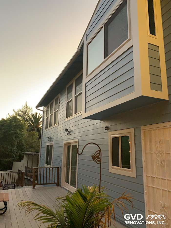 Home exterior showcasing James Hardie Smooth Lap Siding and new vinyl windows in Oakland, CA