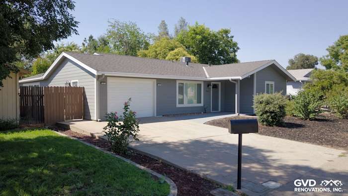 Rocklin home exterior featuring Seal Gray HardiePlank siding, Arctic White trim, and modern landscaping