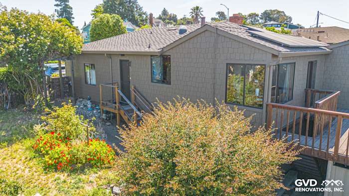 Vallejo home exterior featuring James Hardie Shake and Shingle Siding with custom paint and wooden deck