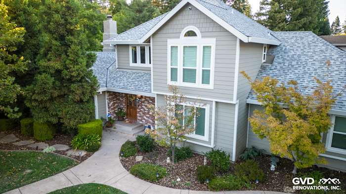 Fair Oaks home exterior featuring James Hardie Cedarmill siding in Monterey Taupe with Arctic White trim