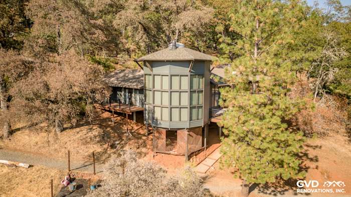 Contemporary home exterior featuring Iron Gray HardiePlank siding and unique cylindrical design in Meadow Vista, CA