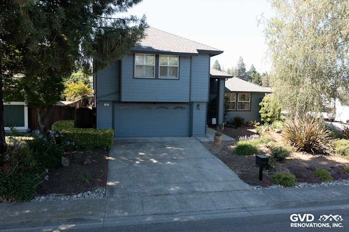 Newly installed James Hardie siding in Boothbay Blue with Milgard windows on a two-story home in Rohnert Park