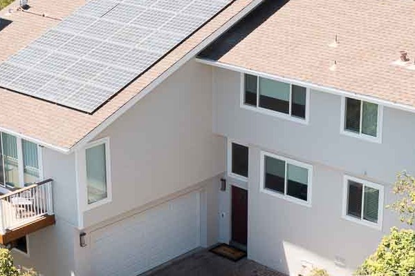 Home exterior renovation in San Rafael with James Hardie siding in Cobble Stone and new Andersen windows, featuring solar