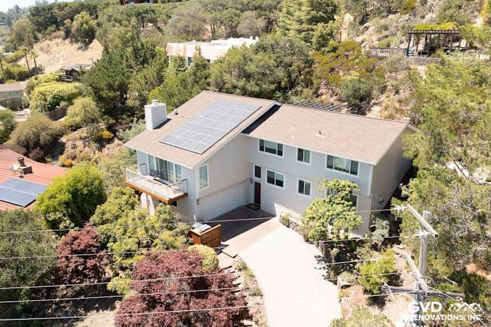 Home exterior renovation in San Rafael with James Hardie siding in Cobble Stone and new Andersen windows, featuring solar
