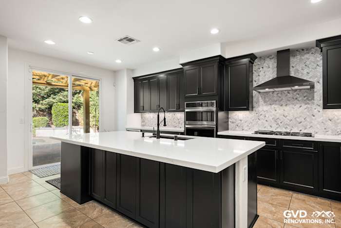 Modern Roseville kitchen remodel with Waypoint cabinets, MSI countertops, and built-in pet feeding station
