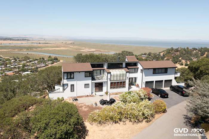 Modern home in San Rafael, CA with Arctic White James Hardie siding and a landscaped front yard