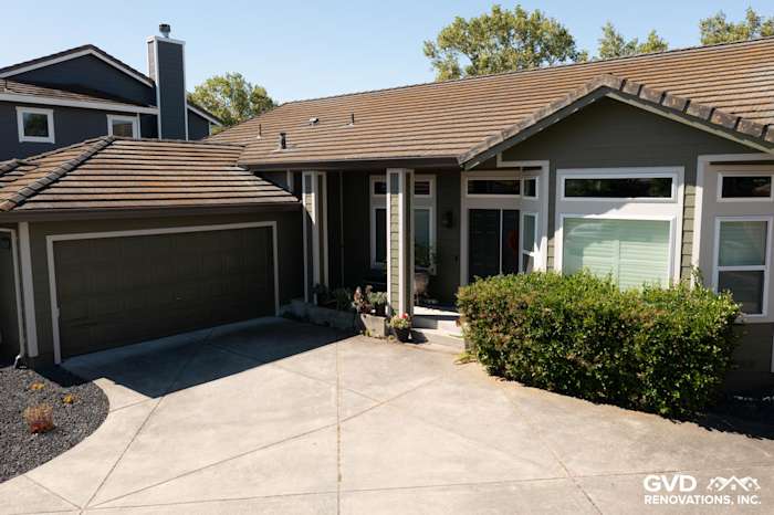 Home exterior featuring Mountain Sage James Hardie siding and Cobble Stone trim in Petaluma, CA, with a landscaped entryway