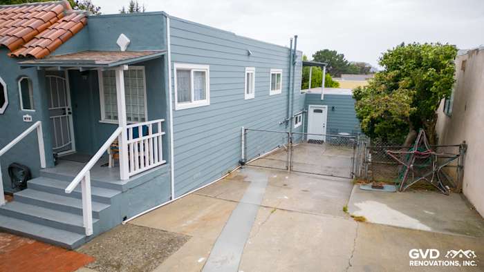 Boothbay Blue HardiePlank siding with Arctic White trim on Brisbane home's exterior, showcasing a refreshed look