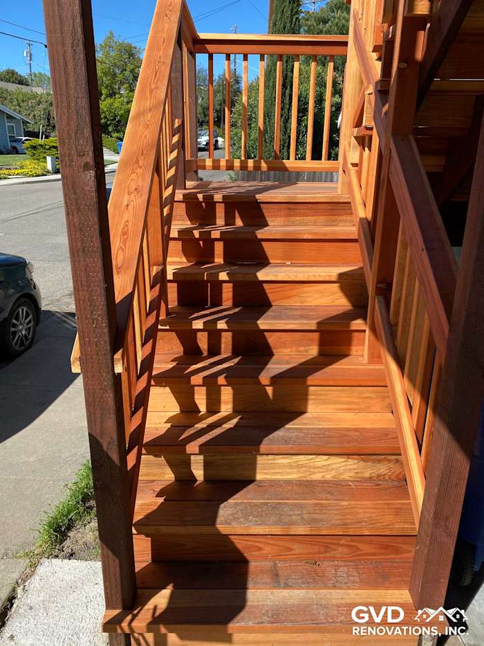 Newly constructed wooden stairs with side steps, featuring rich brown hues, in Rio Vista, CA