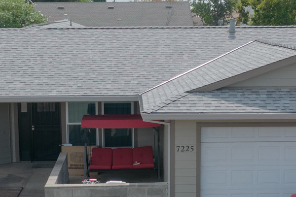 Home exterior featuring James Hardie Monterey Taupe siding, Timber Bark trim, and Milgard windows in North Highlands, CA