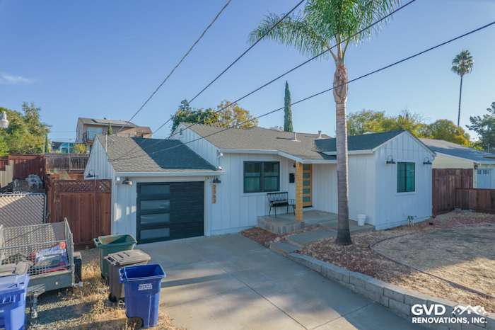 Updated home exterior featuring Arctic White James Hardie siding and trim in Concord, CA, with modern landscaping