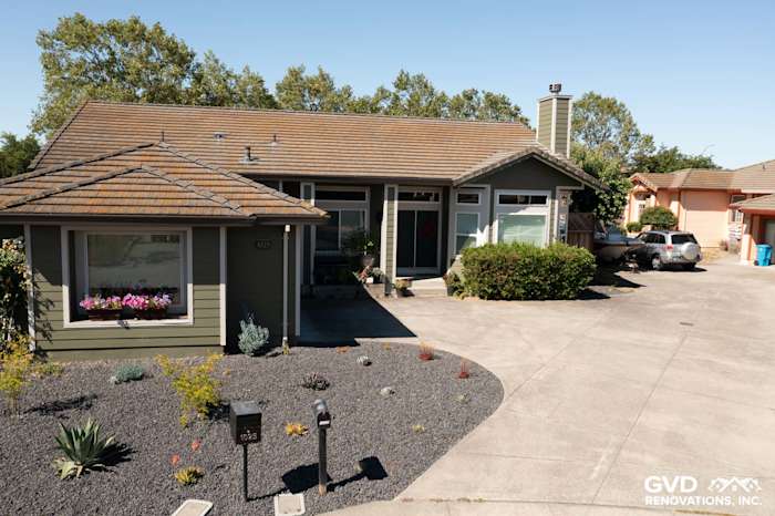 Home exterior featuring Mountain Sage James Hardie siding and Cobble Stone trim in Petaluma, CA, with a landscaped front yard