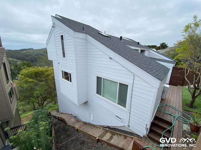 Modern home exterior featuring James Hardie lap siding, trimmed windows, and a sloped roof in Mill Valley