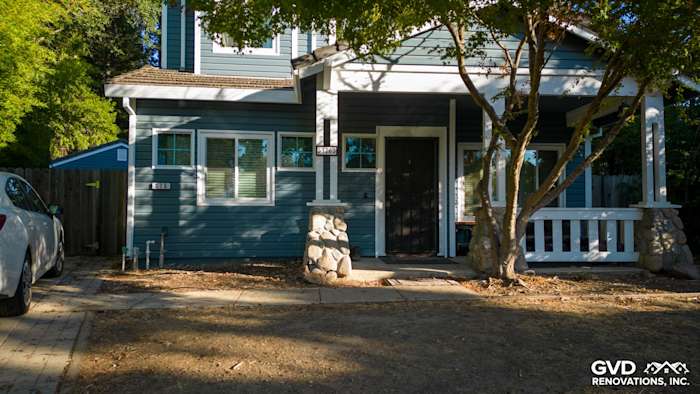 New Alside Prodigy Vinyl Siding in blue with stone accents on a Folsom home exterior