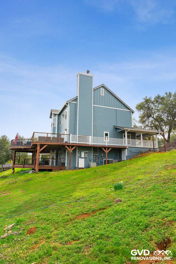 Newly installed James Hardie siding on a two-story home with a spacious deck in Shingle Springs, CA