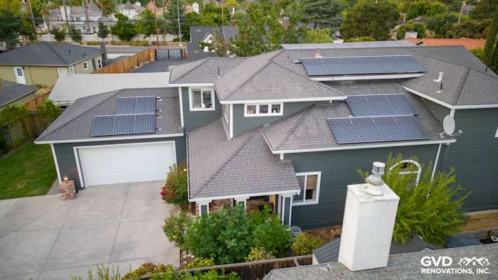 Home exterior featuring James Hardie Pearl Gray siding, Arctic White trim, and solar panels in Campbell, CA