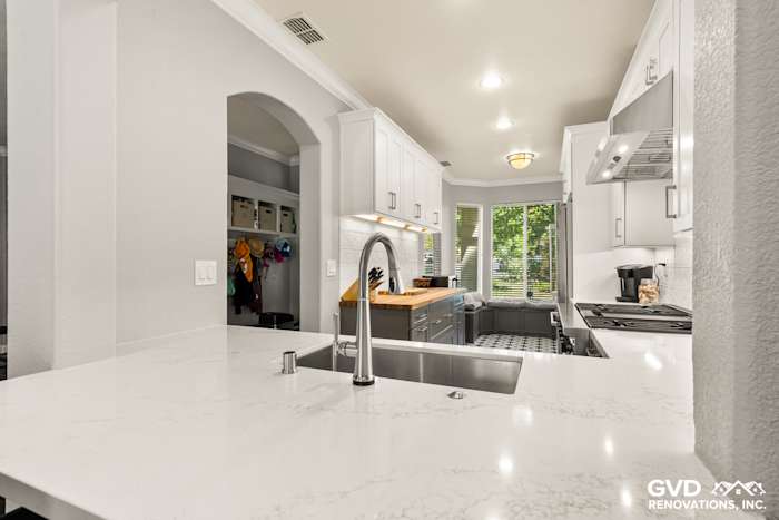 Modern kitchen remodel in Folsom featuring quartz countertops, stainless steel appliances, and bright natural light