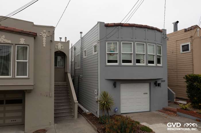 Light Mist HardiePlank siding on home exterior in San Francisco, accented with Arctic White HardieTrim boards