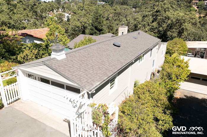 Aerial view of a home in Orinda featuring James Hardie Pearl Gray shingle siding and trimmed roof details