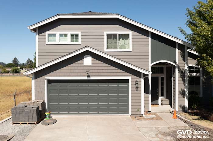 Updated home exterior featuring James Hardie Aged Pewter siding and Arctic White trim in Rohnert Park, CA