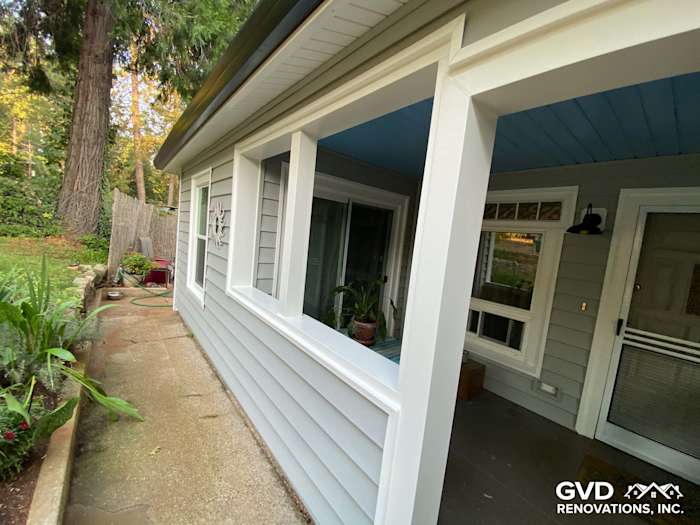 Gray Prodigy vinyl siding with white trim on a home exterior in Grass Valley, CA