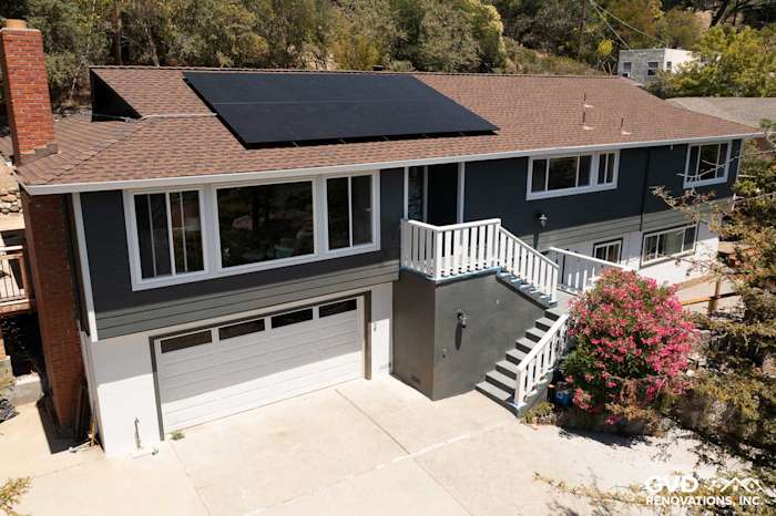 San Rafael home exterior featuring James Hardie Iron Gray siding and Arctic White trim with solar panels