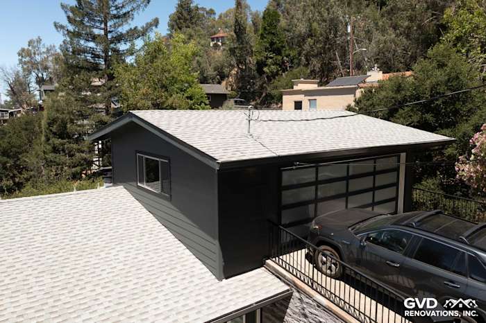 Home exterior in Oakland with James Hardie Iron Gray siding and modern garage design